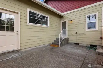 Enjoy outdoor dining on your private fenced patio. With a door to access the garage.