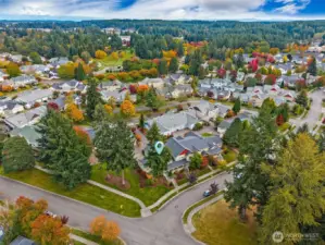 Located on a large private corner lot.