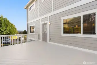 Spacious entertainment deck: low yard maintenance