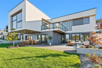 Welcome to a life of modern luxury (patio furniture is virtually staged).