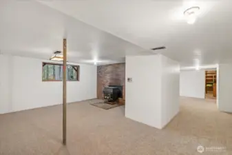 Family room with cozy free standing fireplace