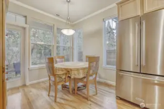 Beautiful stainless steel appliances, gas range. Dining room looks out into the nature preserve.