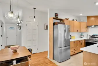 Front door at left and hall closet has the double doors