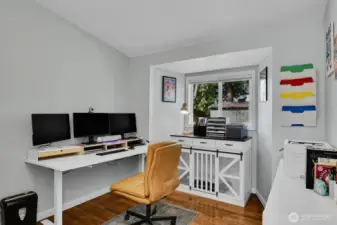 3rd bedroom staged as an office is in the back left of the home.