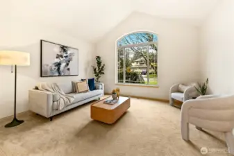 Generous living spaces are filled with natural light, creating an inviting setting that feels both expansive and comfortable.