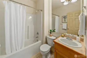 Convenient main-level bath supports guests and everyday use without disrupting the flow of the home.