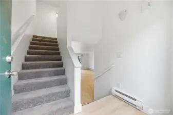 Split level entry with bedroom upstairs and main living downstairs.