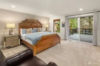Retreat to two luxurious primary bedrooms, each boasting ensuite bathrooms, private balconies, and breathtaking water views. An additional bedroom with an adjacent bathroom offers convenience just across the hallway.