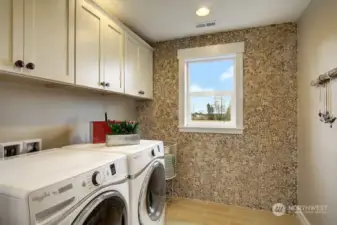 Convenient second floor laundry room! Photo for illustration purposes only & not of actual home available for sale. The Elm design by Toll Brothers built in a previous community.