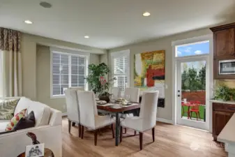 Entertaining is a breeze in this dining room & located right off of the kitchen. Photo for illustration purposes only & not of actual home available for sale. The Elm design by Toll Brothers built in a previous community.