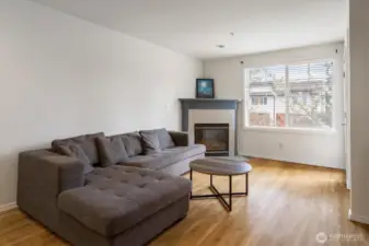 Another look at the living room with gas fireplace.
