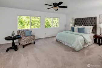 Unwind in your oversized primary suite and personal retreat featuring space for a sitting nook or home office.