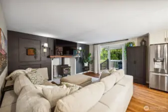 Family room with wood burning fireplace