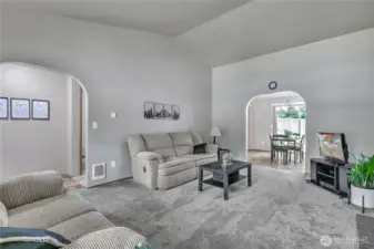 The living room flows into the dining room for easy flow gatherings.
