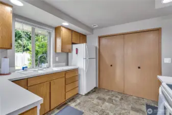 Ample cabinetry and a window to let in the natural light.