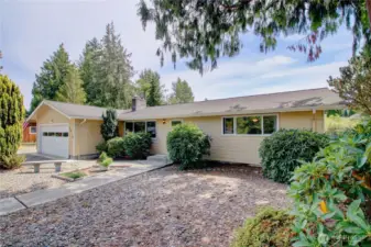 This well maintained home has great curb appeal with easy low maintenance landscaping.
