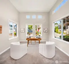 This is another finished room on the main level - perfect home office or could be enclosed for a guest bedroom.