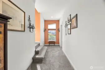 Upper landing is full of light courtesy of a large window, leads to living and dining spaces