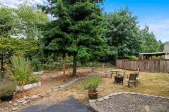 Spacious lawn and patio area ideal for summer gatherings.