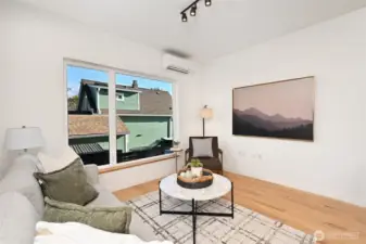 This is a really nice dining, living and kitchen space.