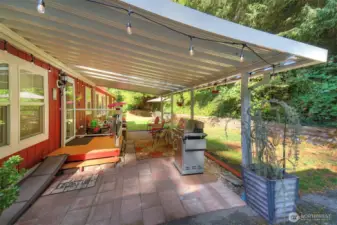 Covered, back patio (note the privacy)