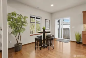 Huge nook area w/slider leading out to backyard oasis.