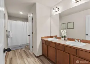Double vanity sinks in the main bath as well.