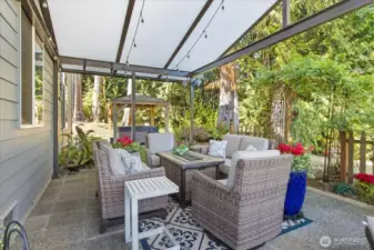 Covered patio for year round enjoyment.