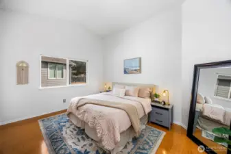 The spacious primary bedroom is a peaceful retreat.