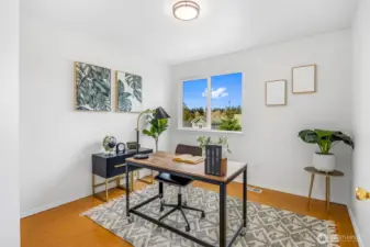 This flexible upper-level room works beautifully as a home office or bedroom.