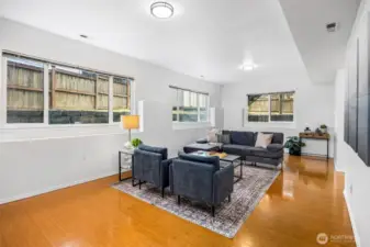 The expansive lower-level bonus room offers incredible flexibility as a second living space, playroom, or media room.