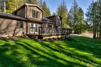 Fresh lawn and landscaping highlight the home.