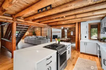 Quartz counters and waterfall edge island.