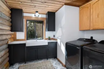 Beautiful laundry room, your clothes will practically fold themselves!