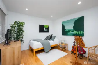 The private guest bedroom occupies its own wing and comes with a separate full bathroom for added privacy.