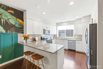 The bright and functional kitchen is seamlessly connected to the main living areas.