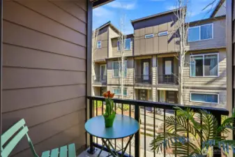 Charming balcony: your own outdoor nook   for coffee, conversation, or a breath of fresh  air.