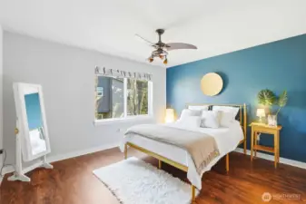 Serene primary suite designed for comfort  and relaxation at the end of the day.