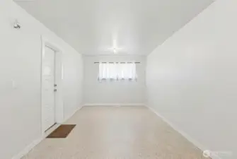 This flexible section of the garage is ideal for a home office, fitness area,  studio or workshop.