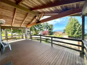 Huge covered deck to allows you to enjoy outdoor living all year round