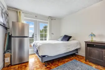 Second upstairs bedroom with deck access