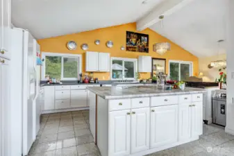 Open concept kitchen, living and dining room