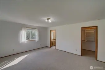 Primary suite with walk in shower and full bath.
