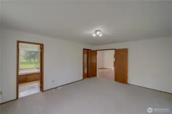 Primary suite with walk in shower and full bath.