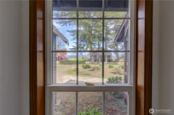 View from the downstairs hallway to the utility room, bathroom and garage