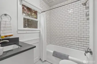 Main Floor full bath with radiant heated floors.