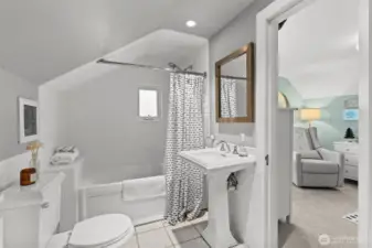 Full bath on second floor features radiant floor heating and a jacuzzi tub.