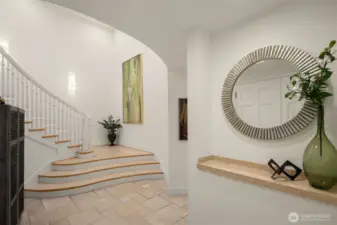 Step into the grand foyer 2001 built home entrance on the middle floor.  The residence is up the staircase, Offices are to the right.