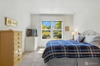 Bedroom #2 - the Guest bedroom - full of light & adjacent to 2nd full bath.  Perfect for guests as it is on opposite end of home.