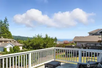 Enjoy peaceful water views of the Admiralty Inlet from the large   30x15 deck!